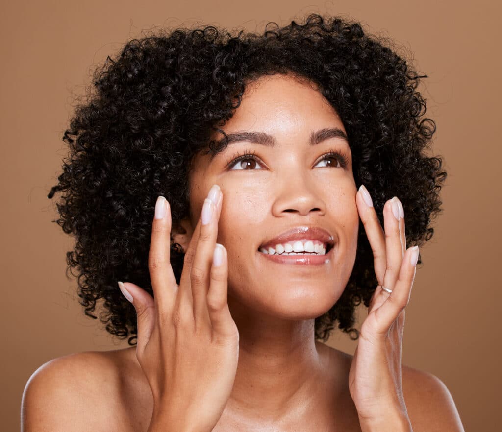 Woman with smooth forehead skin after Botox treatment.